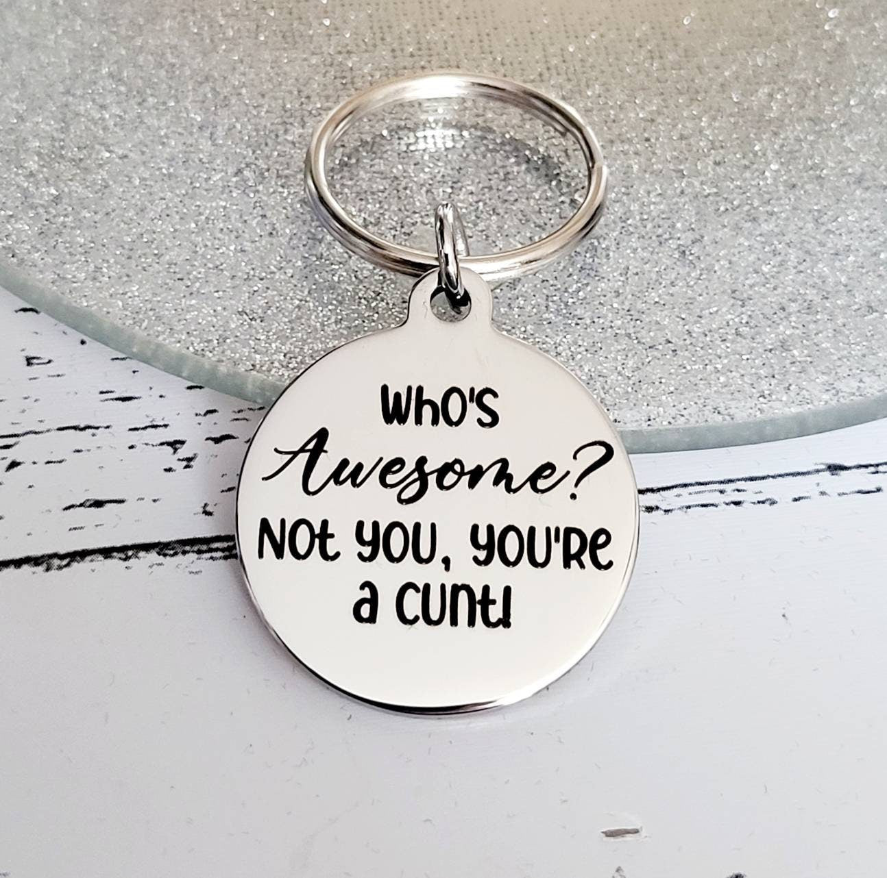 Who's awesome? Not you, you're a cunt. Profanity keyring.