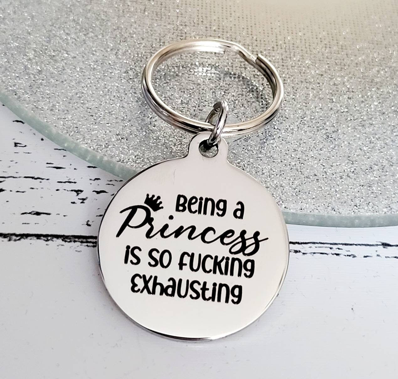 Being a princess is so fucking exhausting. Profanity keyring.