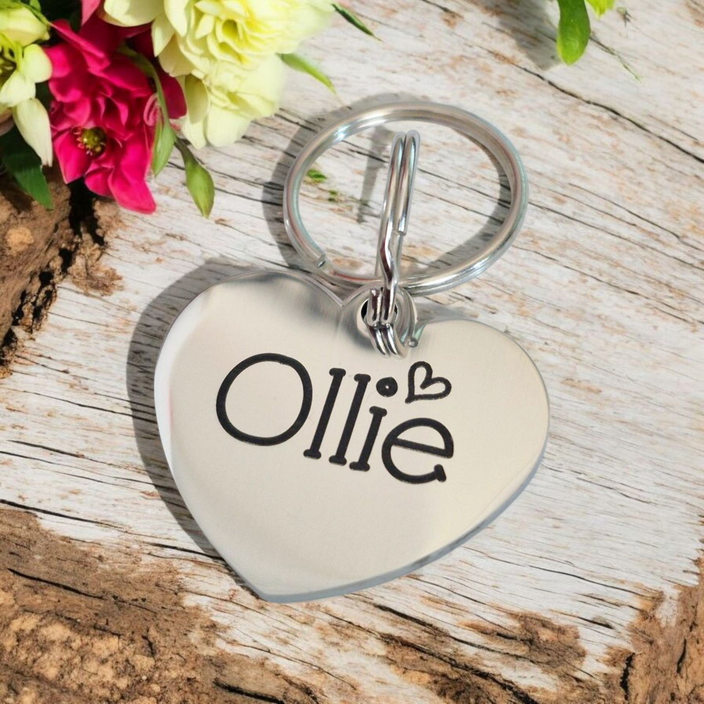 Heart shaped pet ID tags, laser engraved, various fonts to choose from.