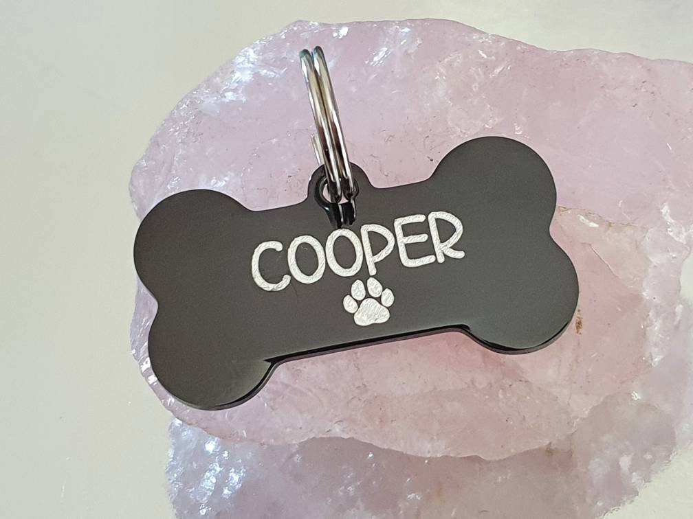 Dog ID tags, stainless steel black bones with silver showing through, various fonts to choose from