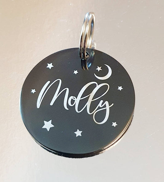 Dog ID tags, black disk with silver/white showing through, various fonts and sizes to choose from