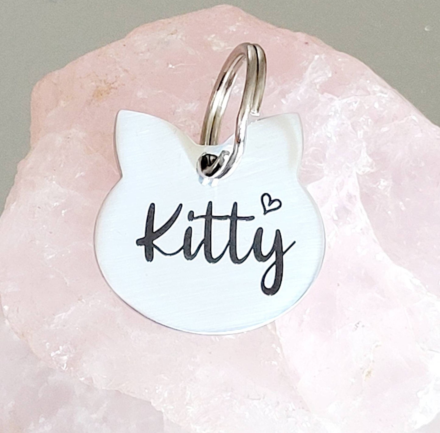 Stylish cat shaped silver cat ID tag laser engraved,  stainless steel.