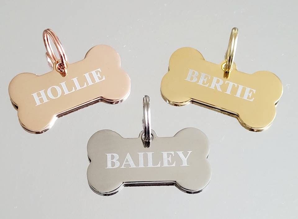 Bone pet tags laser engraved, available in silver, gold and rose gold.