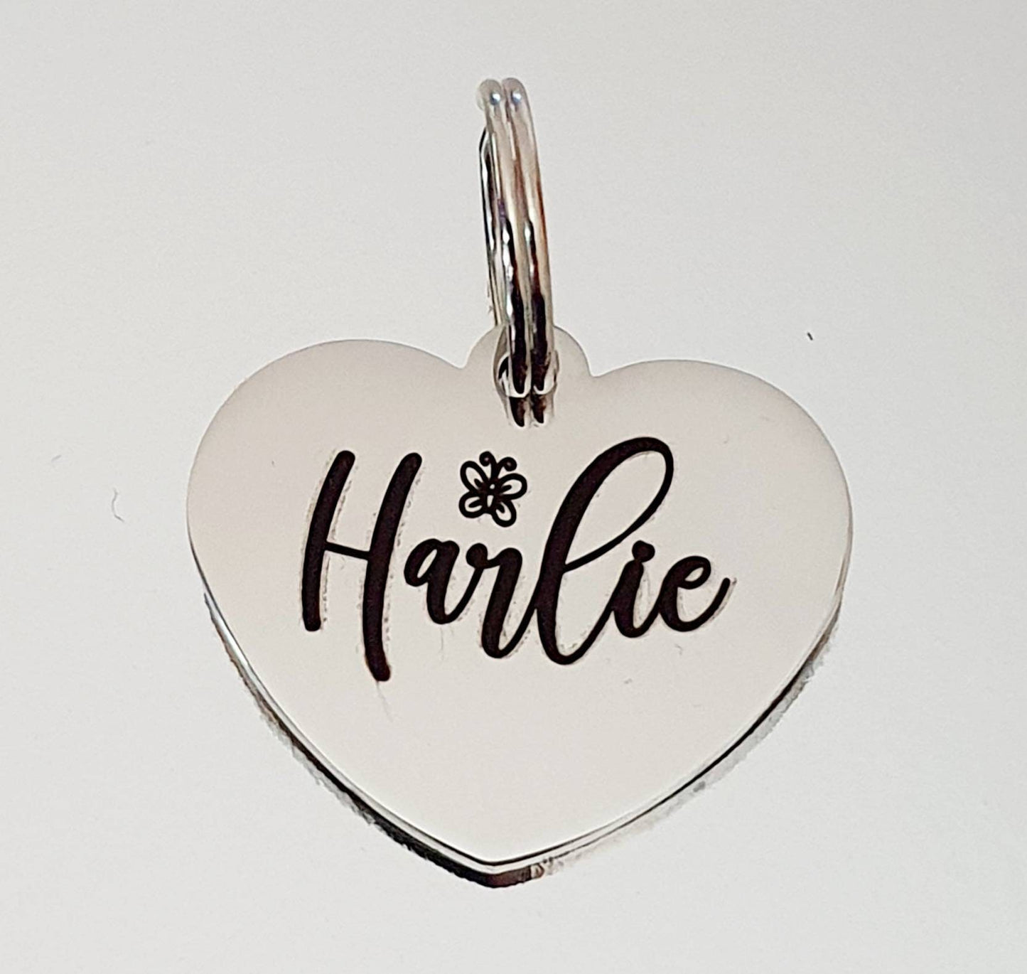Butterfly design Silver Stainless Steel heart pet ID tag.  Laser engraved.