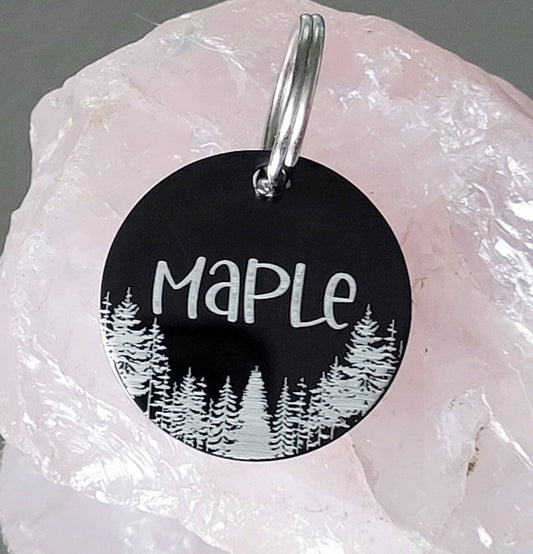 Woodland design ID tags, black disk with silver/white showing through, various fonts and sizes to choose from