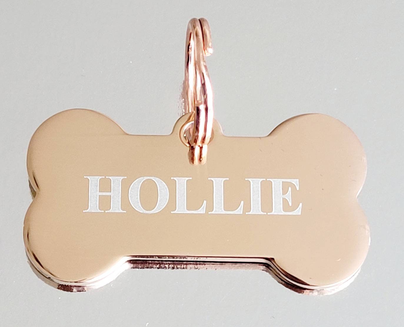 Bone pet tags laser engraved, available in silver, gold and rose gold.