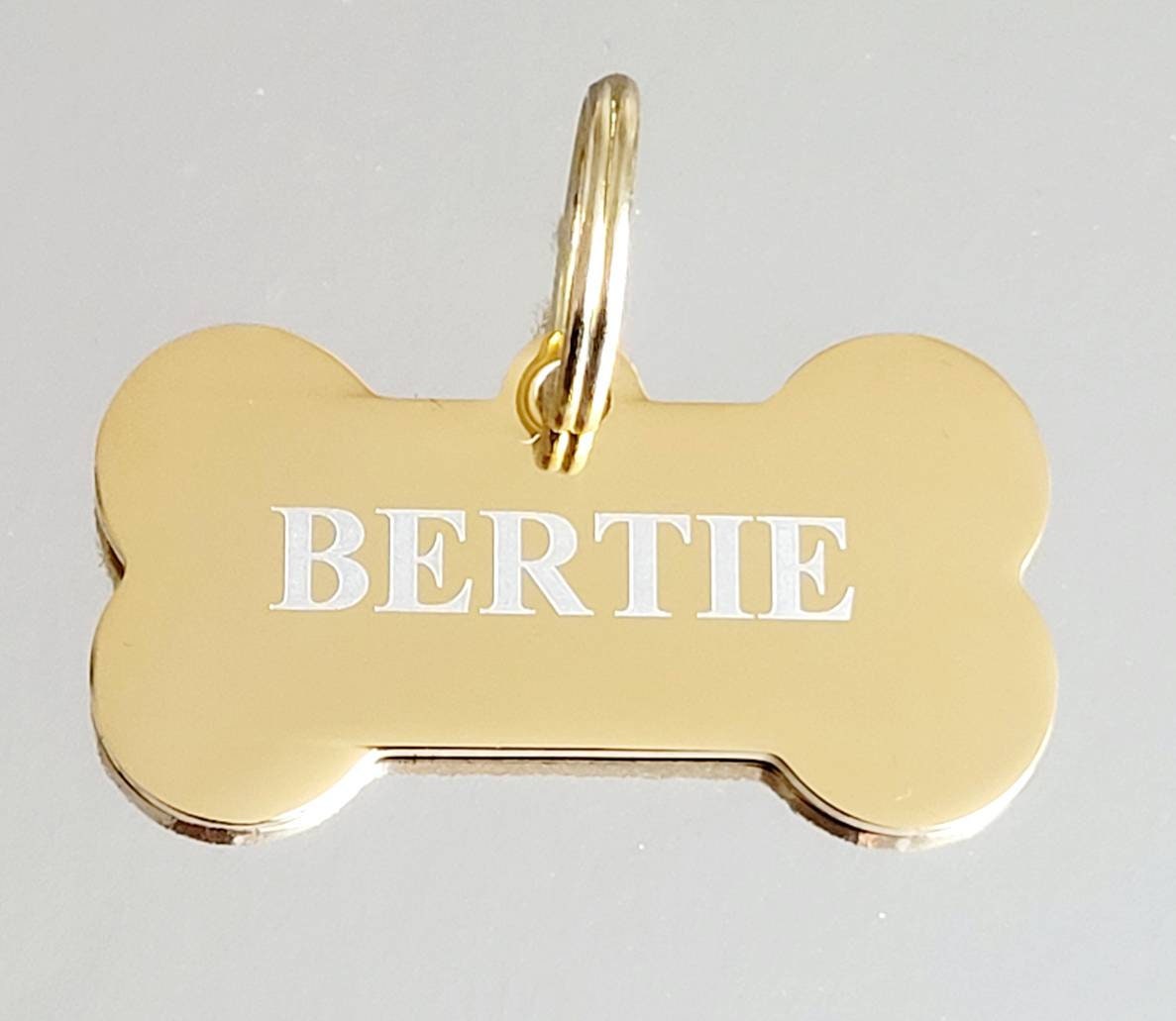 Bone pet tags laser engraved, available in silver, gold and rose gold.