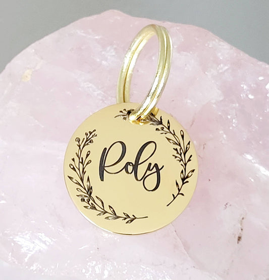 Tiny 20mm cat or puppy ID tags laser engraved,  stainless steel available in silver, gold and rose gold.  Gentle border design