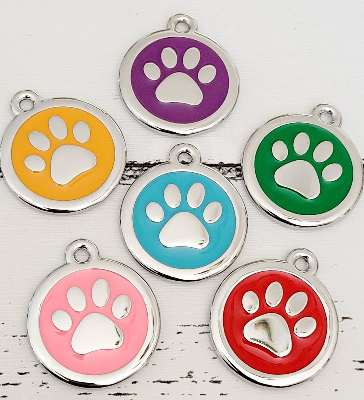 Quality coloured paw dog or cat ID tag, laser engraved.