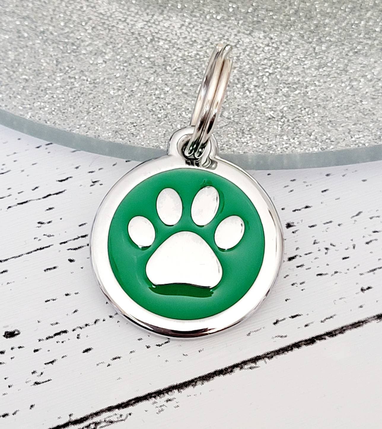 Quality coloured paw dog or cat ID tag, laser engraved.