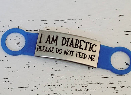 I am diabetic, Please don't feed me! silicone and Steel pet ID tags, 2 sizes and 4 colours to choose from. Laser engraved. Cat tag
