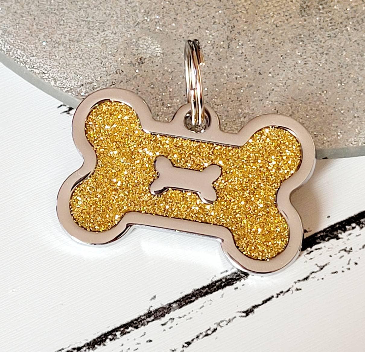 Quality coloured purple sparkly bone dog ID tag, laser engraved.