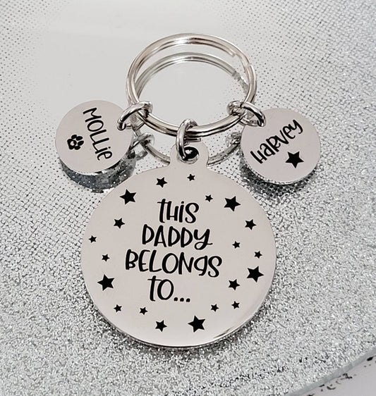 This Daddy belongs to... star design keyring,  Can be personalised to grandad, uncle etc.