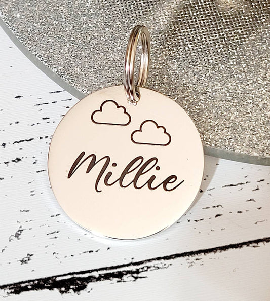 Cloud design.  Pet ID tags laser engraved,  stainless steel available in silver, gold and rose gold