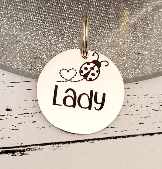 Ladybird design.  Pet ID tags laser engraved,  stainless steel available in silver, gold and rose gold