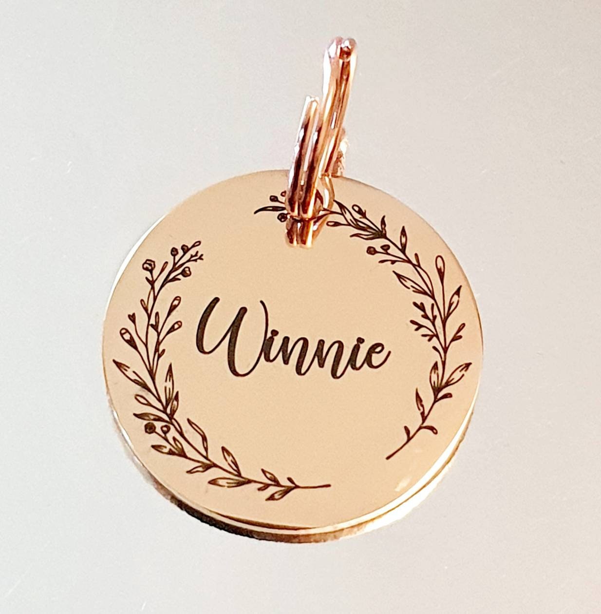 Beautiful stylish pet ID tag, with 'gentle' border design. Available in silver, gold, rose gold or black stainless Steel