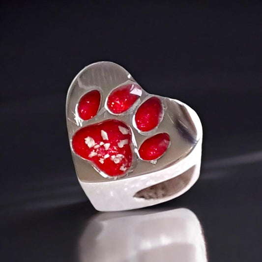Cremation Ashes or Hair memorial paw charm to fit snake chain or pandora style bracelet. Engraved on the back. 40 colours to choose from.