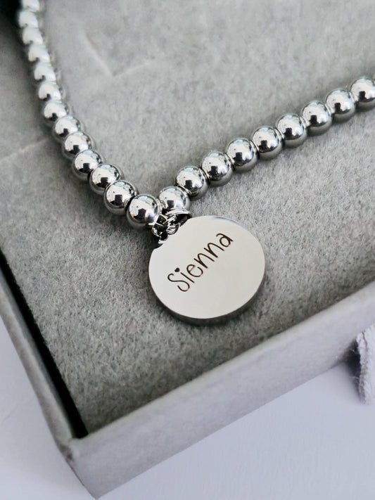 Personalised ladies 18cm beaded bracelet, with stainless steel round pendant. gift for her, ladies gifts
