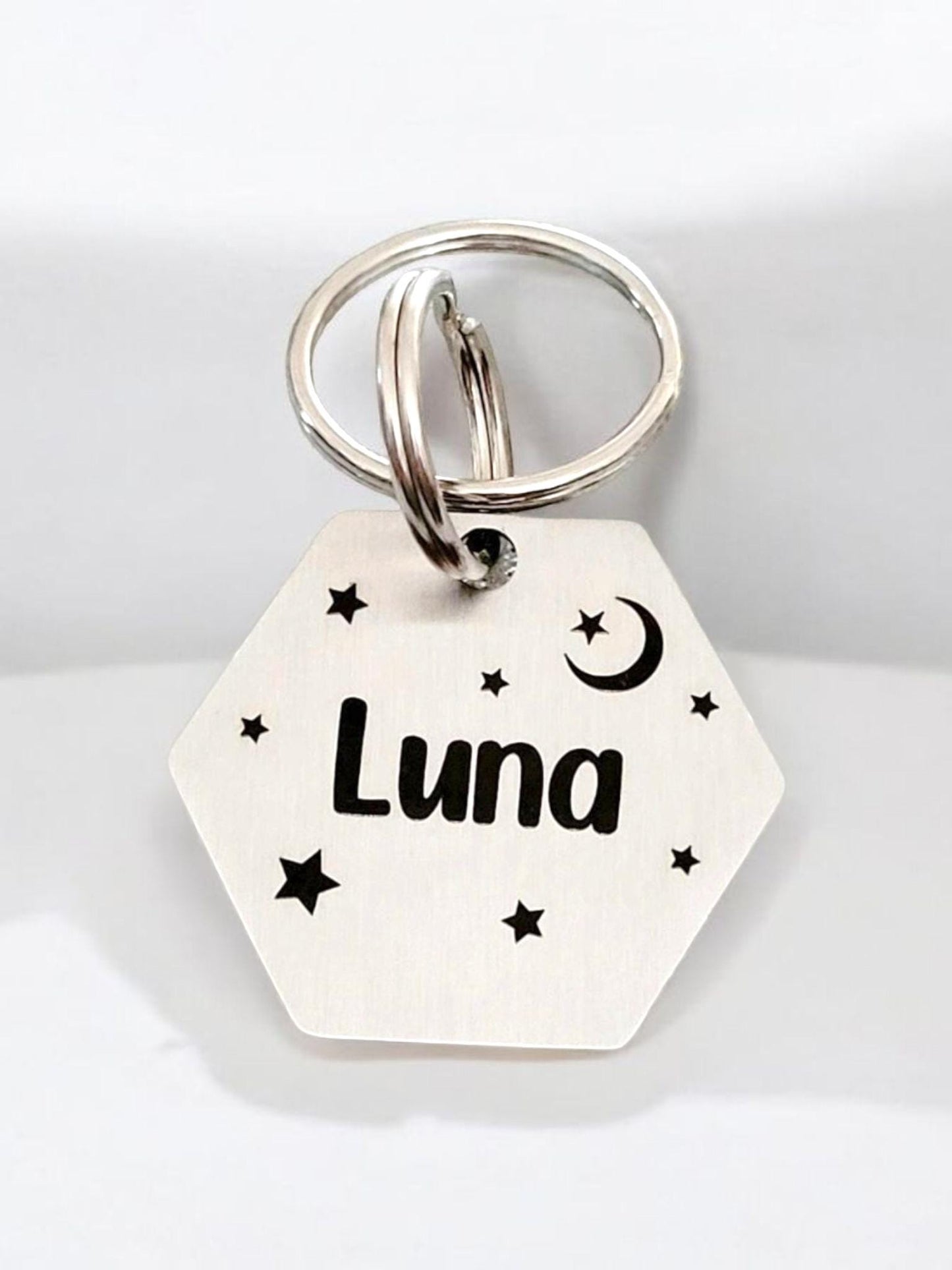 Beautiful star design stylish 30mm hexagon pet ID tag. Available in silver, gold, rose gold, blue or black Steel.