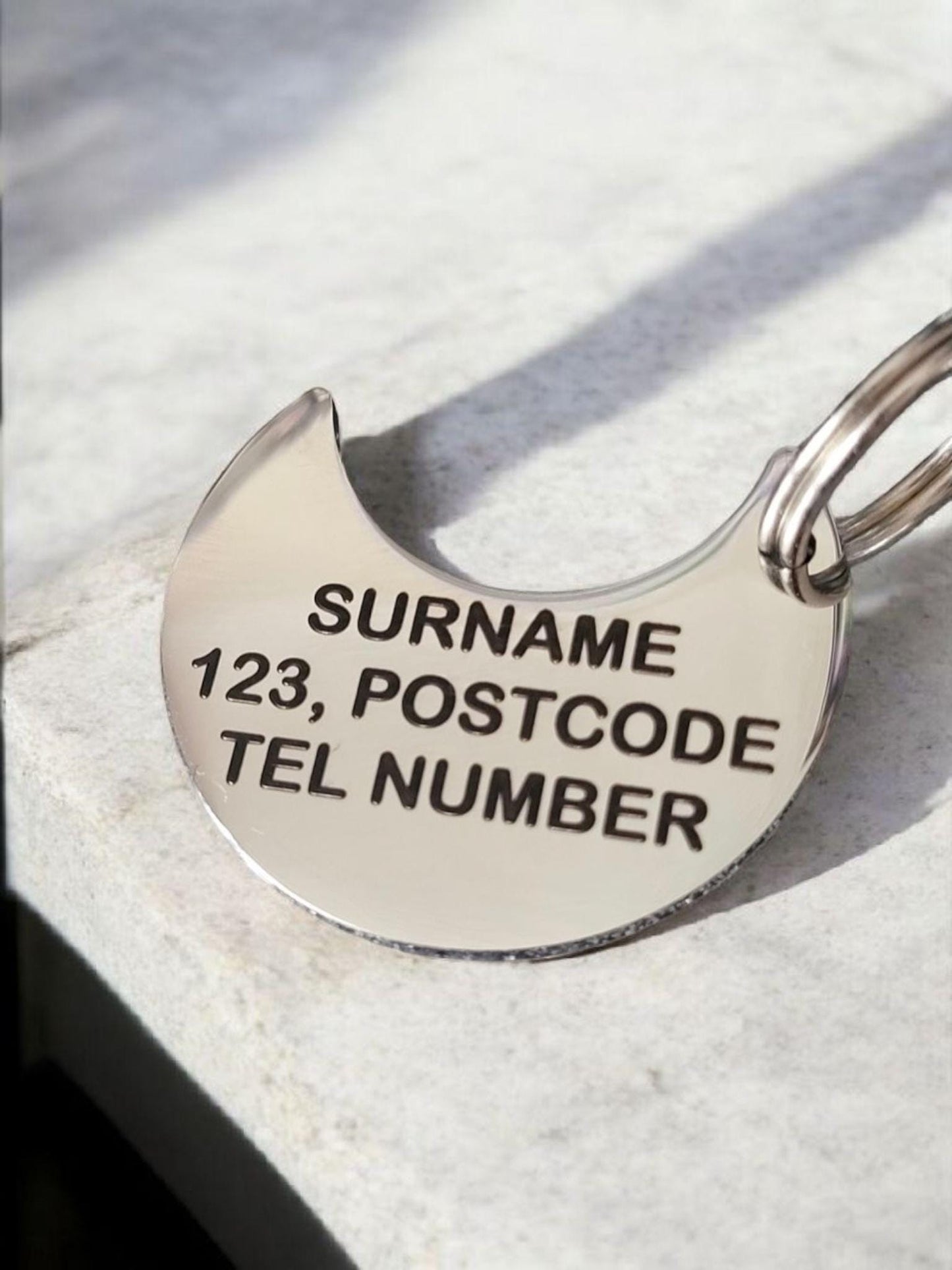 30mm Moon shape Pet ID tag. ID information on the back. Laser engraved.