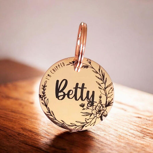 Beautiful stylish pet ID tag, with floral border design. Available in silver, gold, rose gold or black stainless Steel