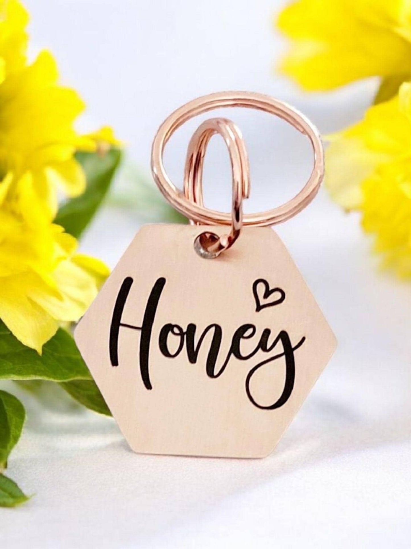 Beautiful star design stylish 30mm hexagon pet ID tag. Available in silver, gold, rose gold, blue or black Steel.