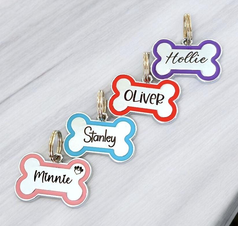 Alloy bone shaped dog ID tag, various colours and sizes.