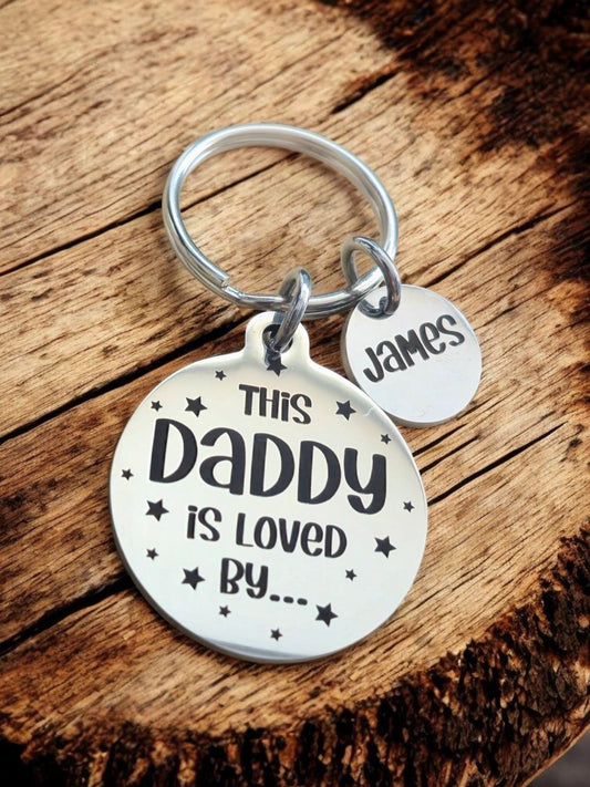 This Daddy is loved by... keyring,  Can be personalised to Grandad,  uncle etc.