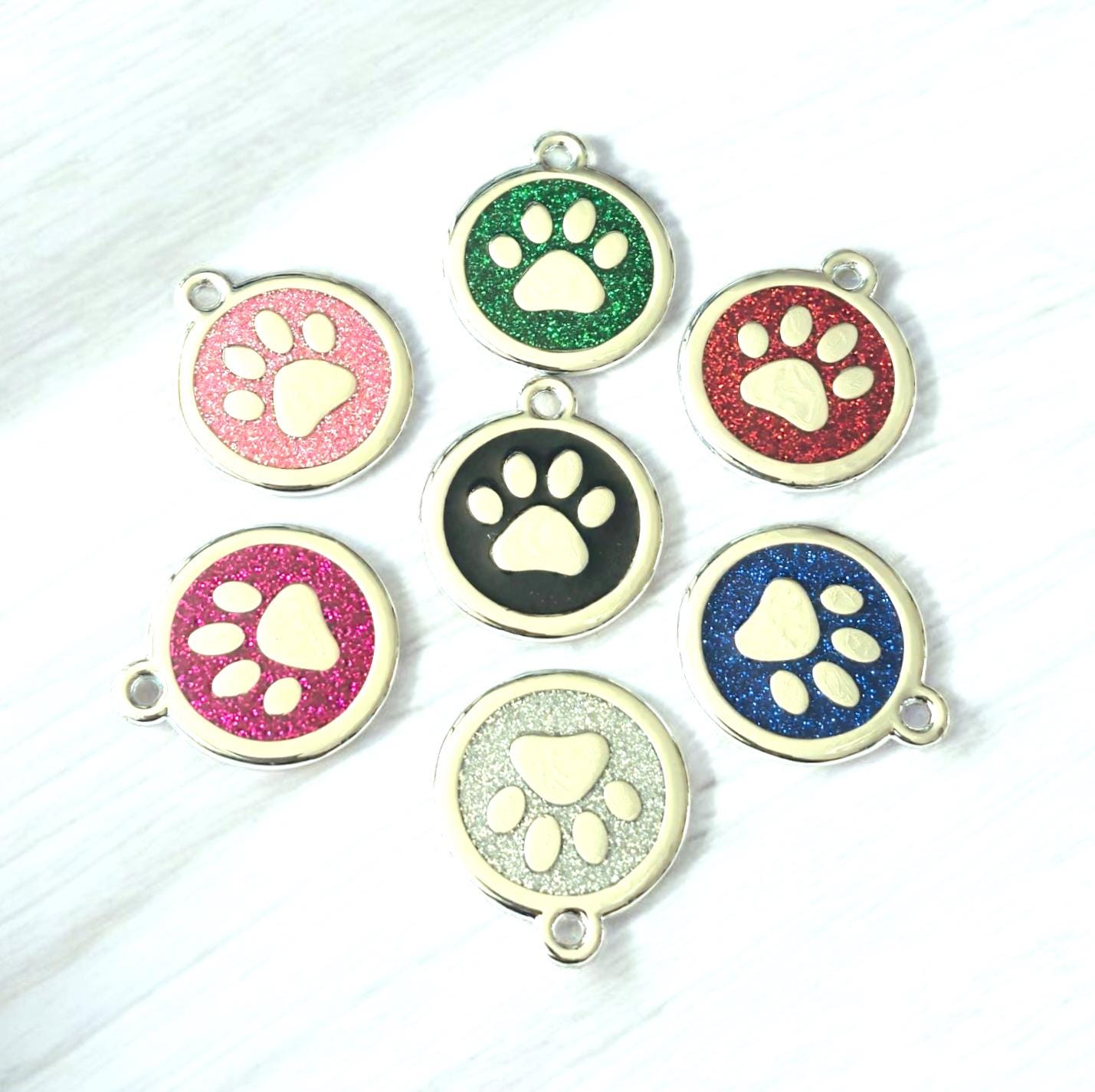 Quality silver alloy with GLITTER coloured paw dog or cat ID tag, laser engraved. Includes a split ring.