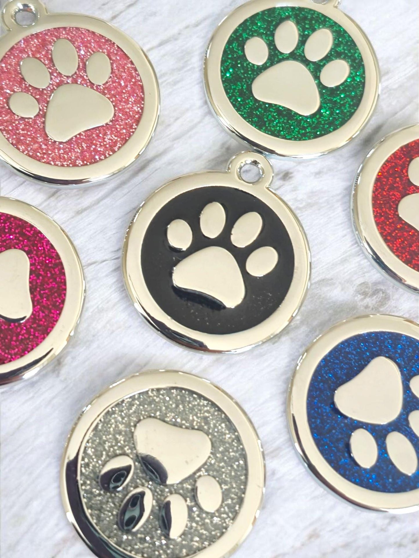 Quality silver alloy with GLITTER coloured paw dog or cat ID tag, laser engraved. Includes a split ring.