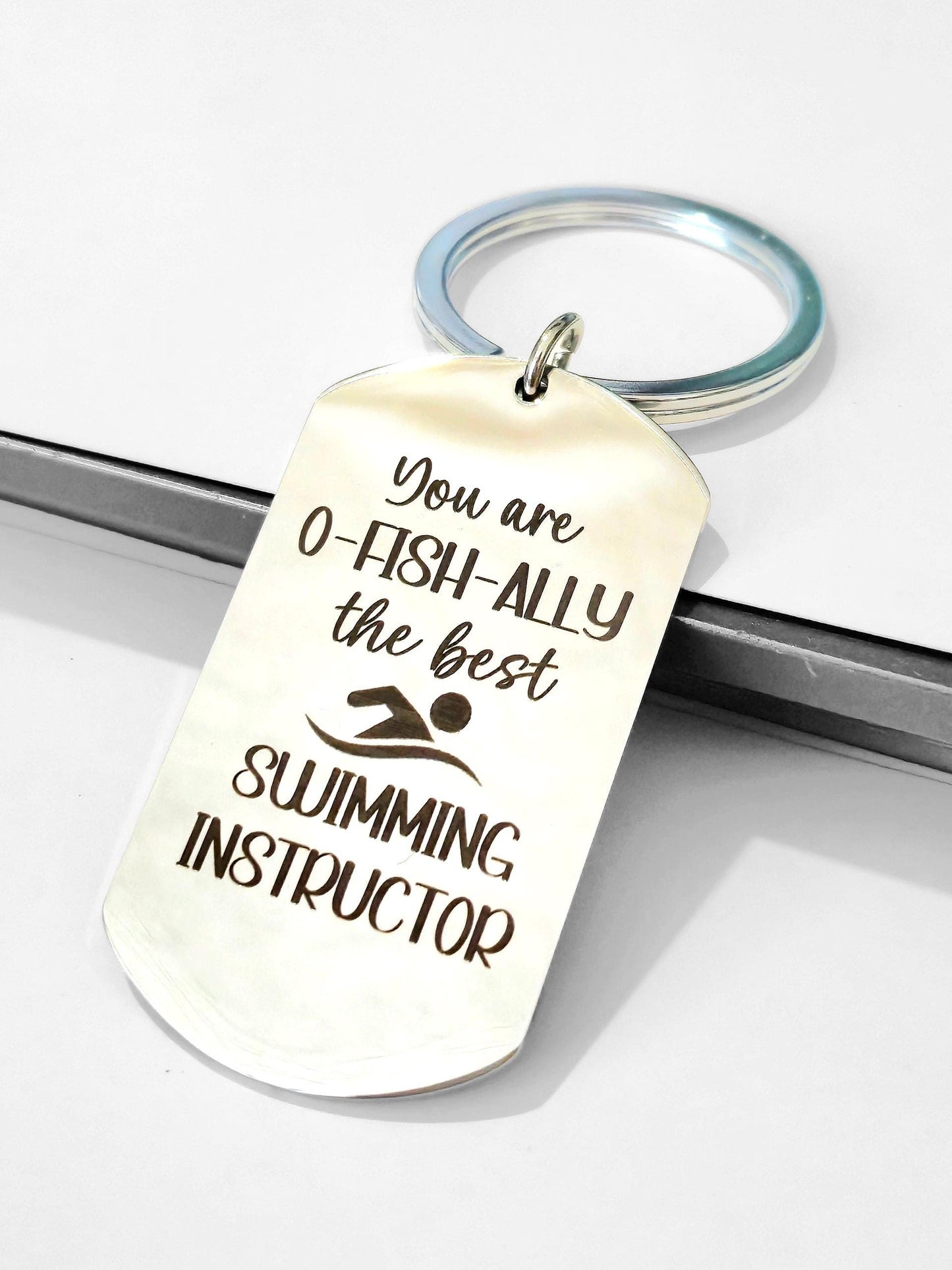 Swimming instructor Keyring. With optional message on the back. Swimming gift.  Can be personalised to different words.