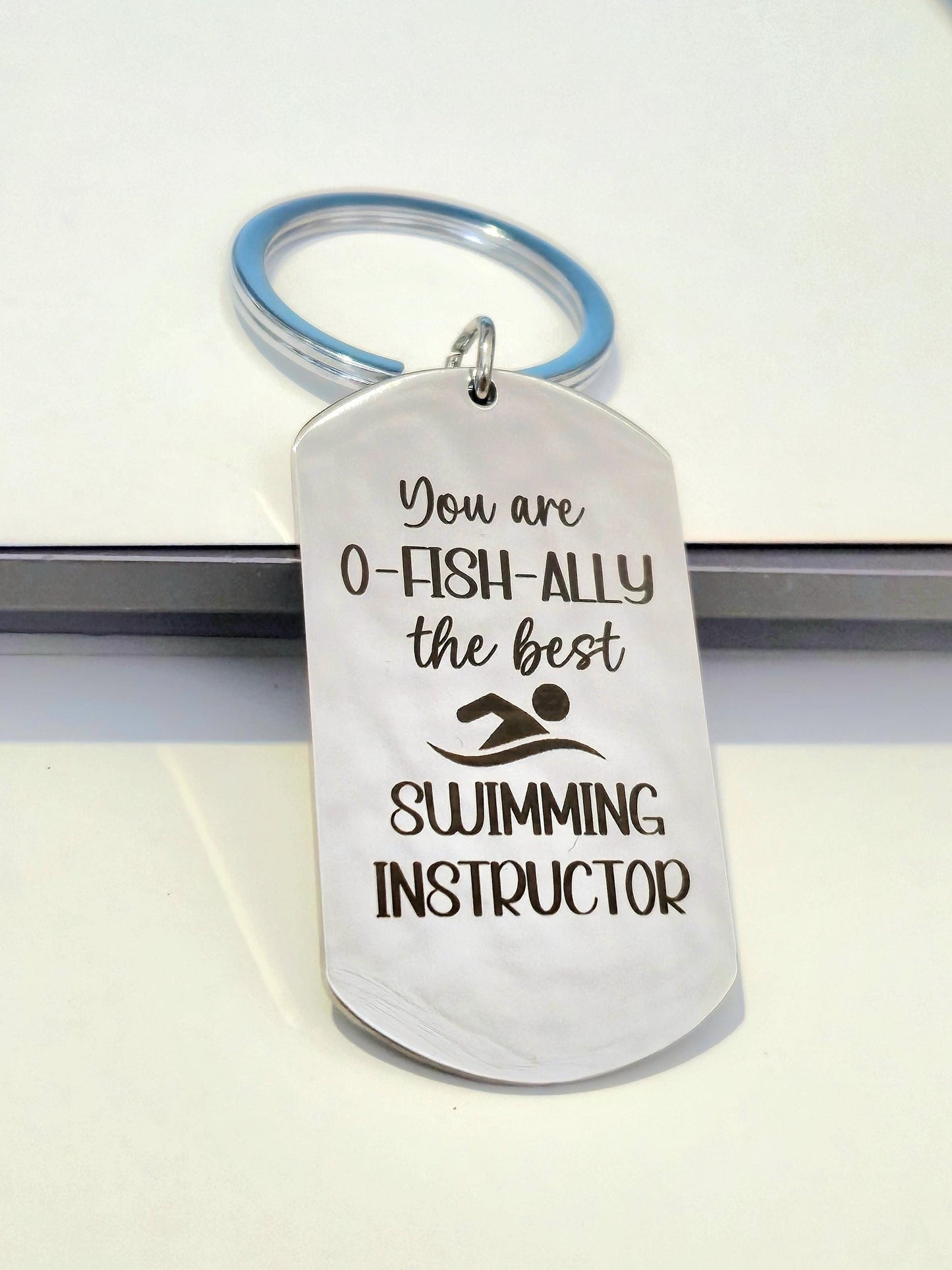 Swimming instructor Keyring. With optional message on the back. Swimming gift.  Can be personalised to different words.