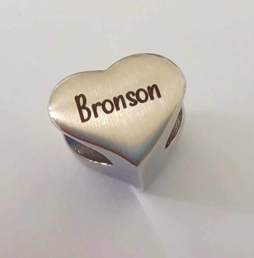 Cremation Ashes or Hair memorial split heart charm to fit snake chain or pandora style bracelet. Engraved on the back. 40 colours to choose from