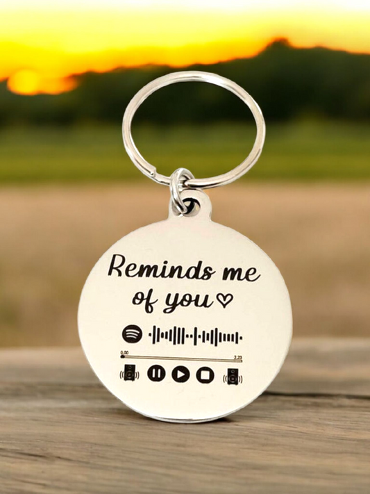 Custom Spotify song keyring with personal message.