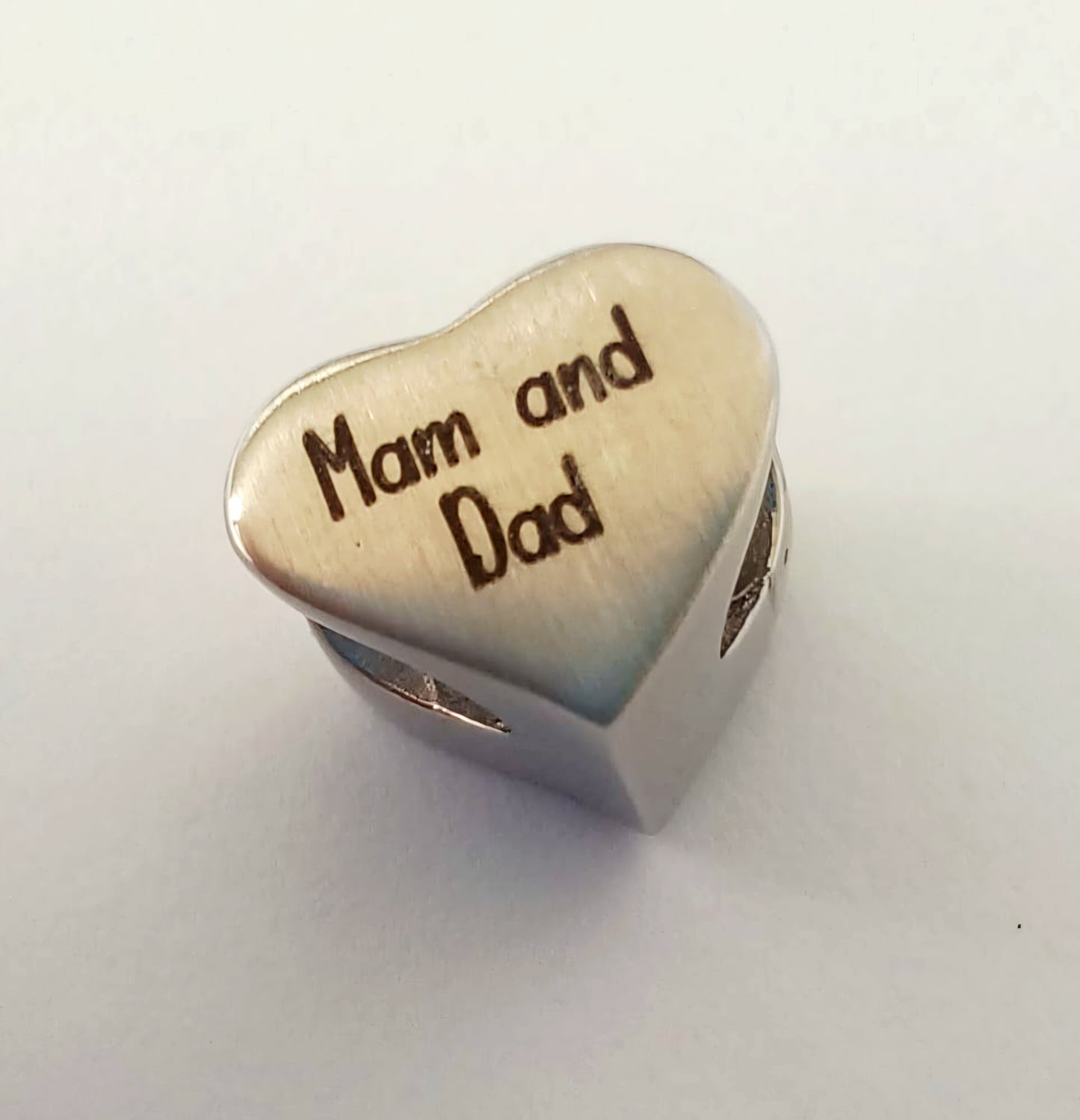 Cremation Ashes or Hair memorial split heart charm to fit snake chain or pandora style bracelet. Engraved on the back. 40 colours to choose from