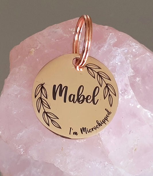 Laser Engraved stainless steel disk with leafy wreath