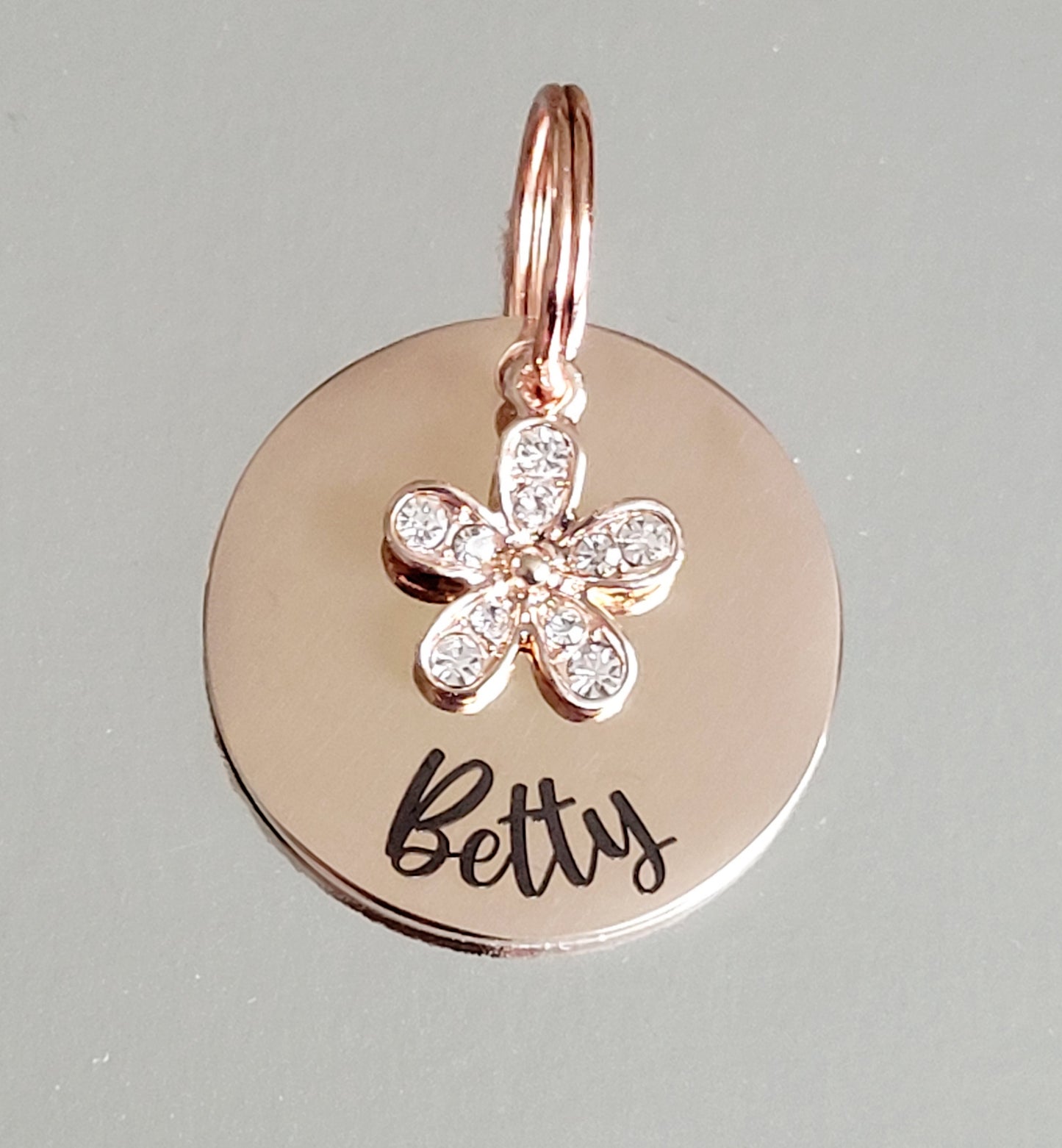 Flower charm and steel disk ID tag