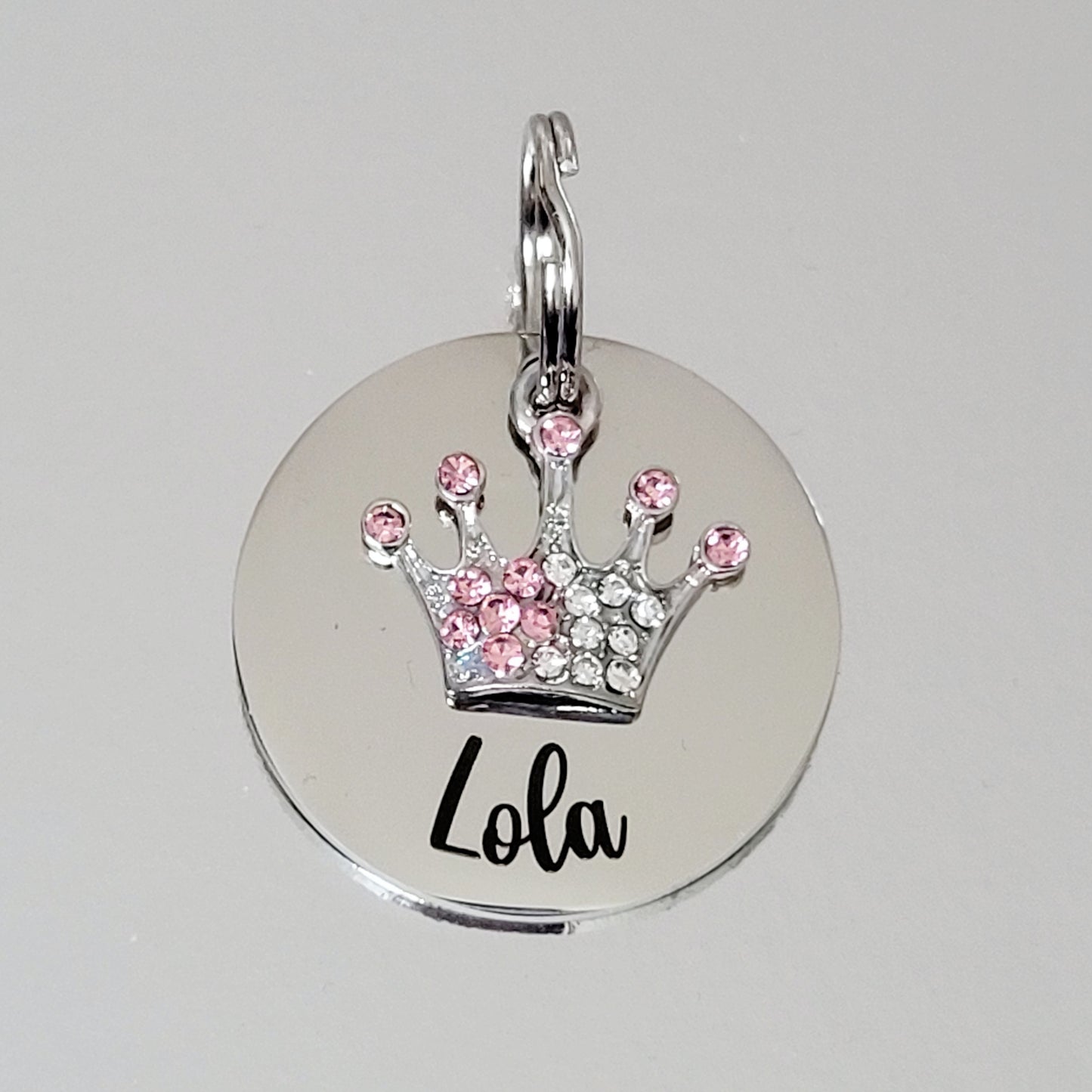 Pink or blue crown and steel disk ID tag