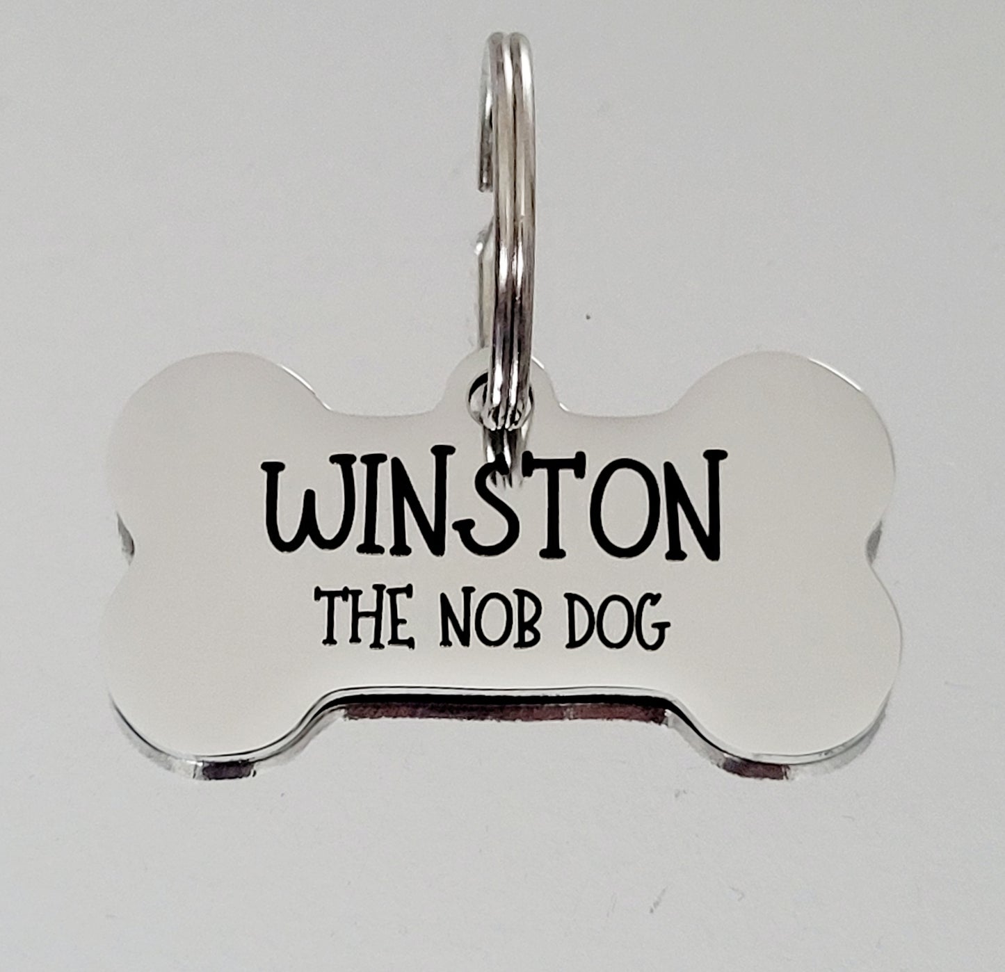 The Nob Dog design bone ID Tag