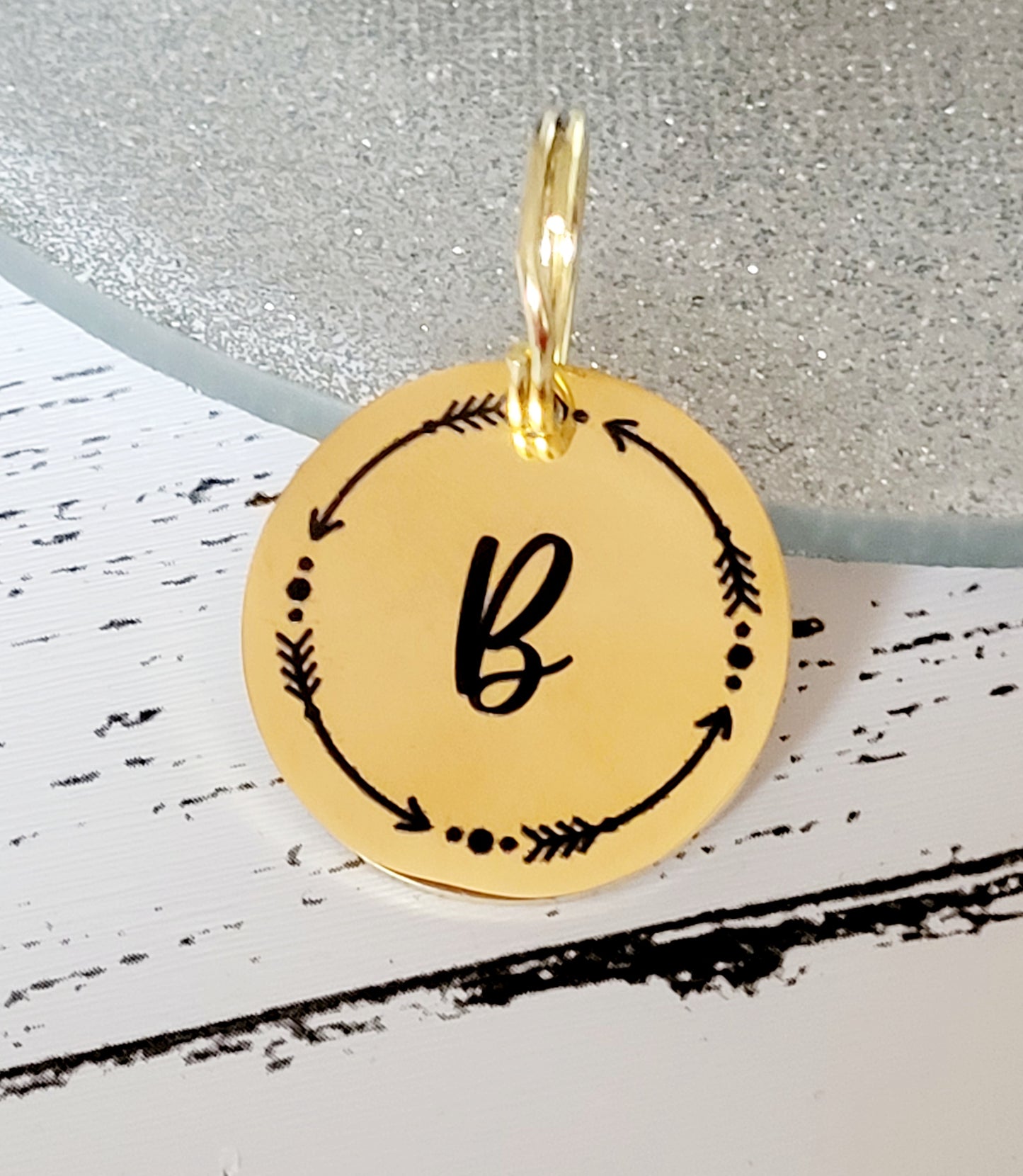 Laser Engraved stainless steel disk with arrow border