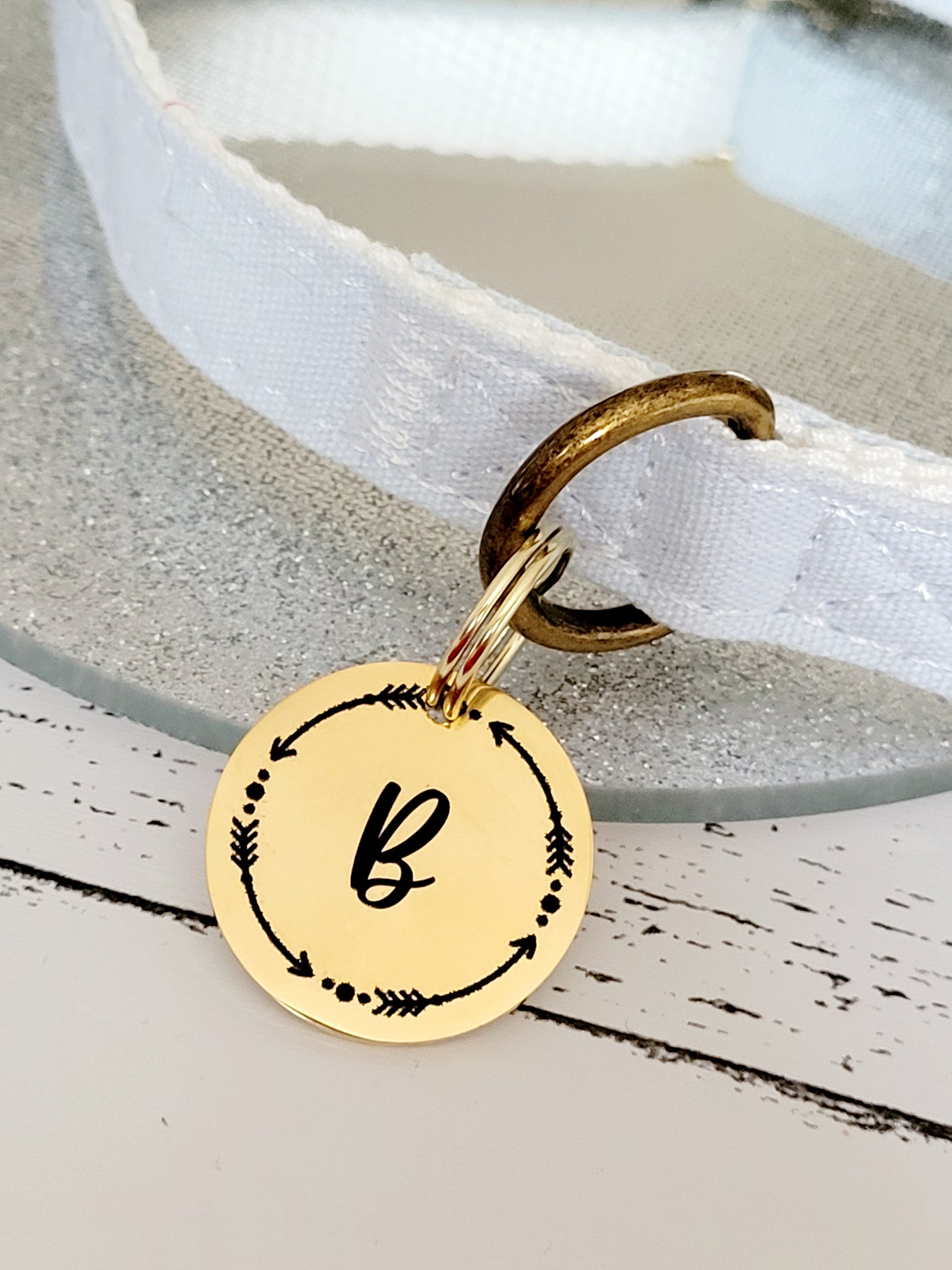 Laser Engraved stainless steel disk with arrow border